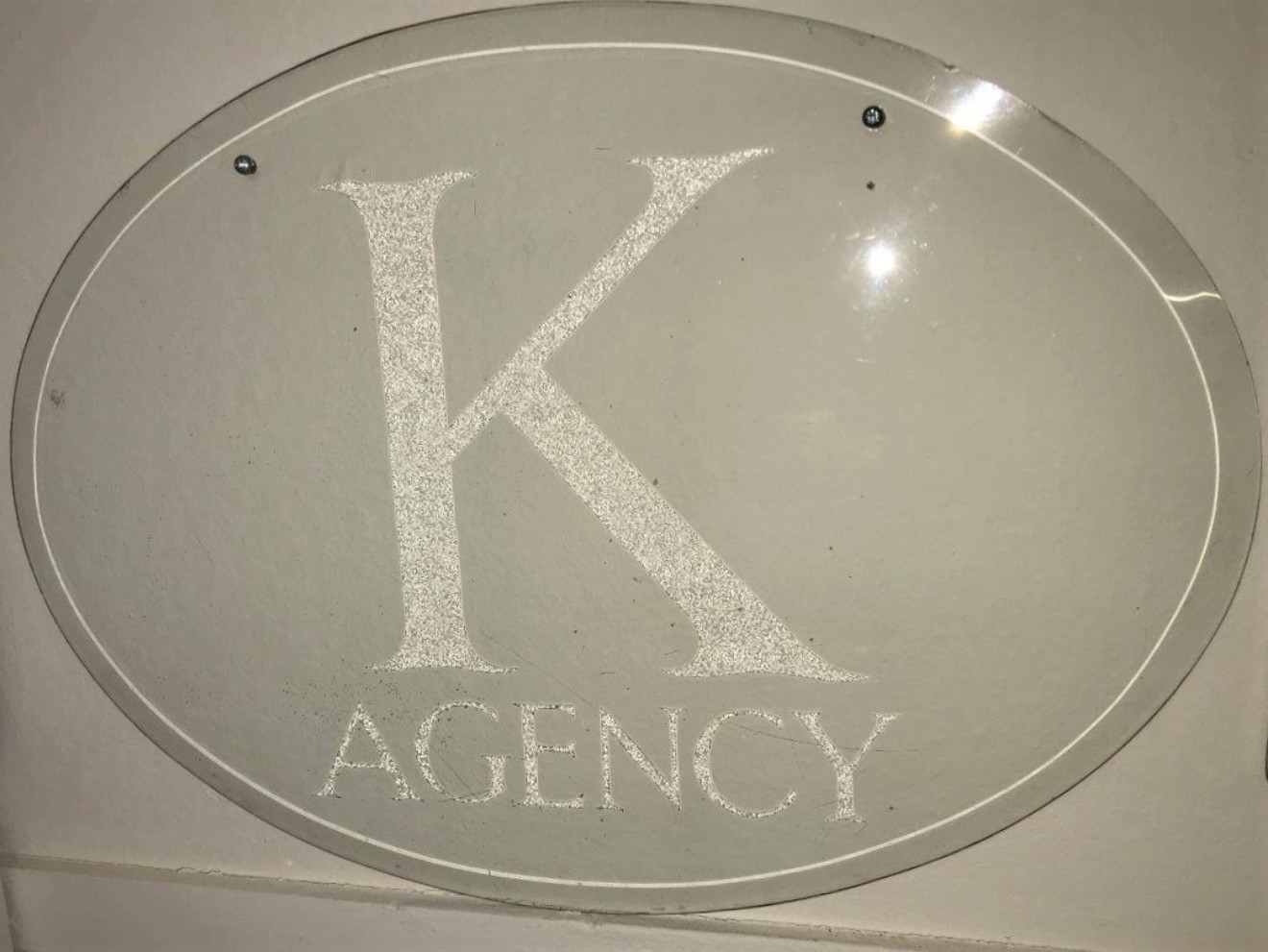 Glass Etched Advertising Sign "K Agency"