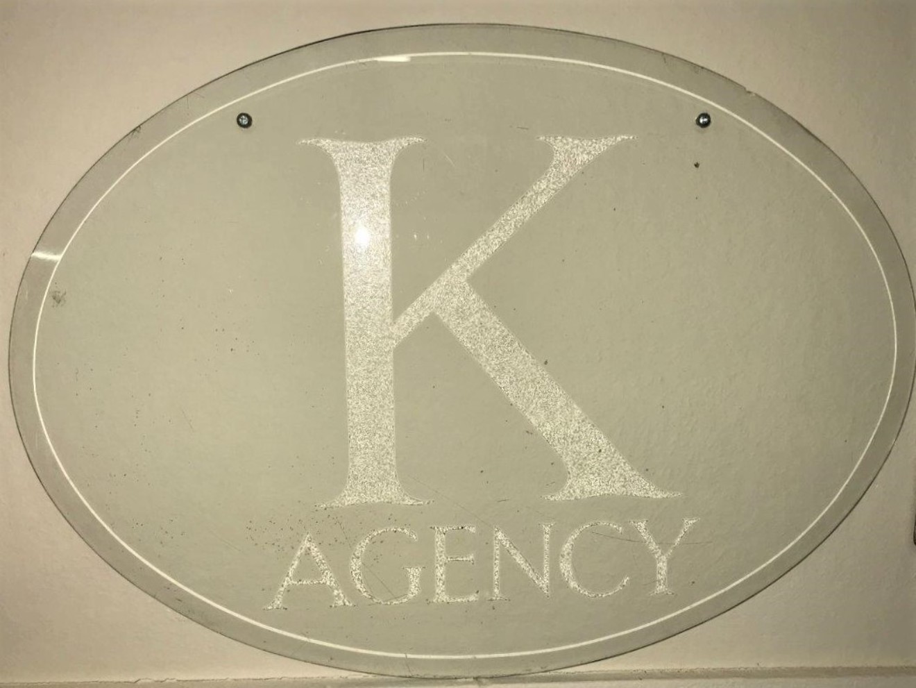 Glass Etched Advertising Sign "K Agency"