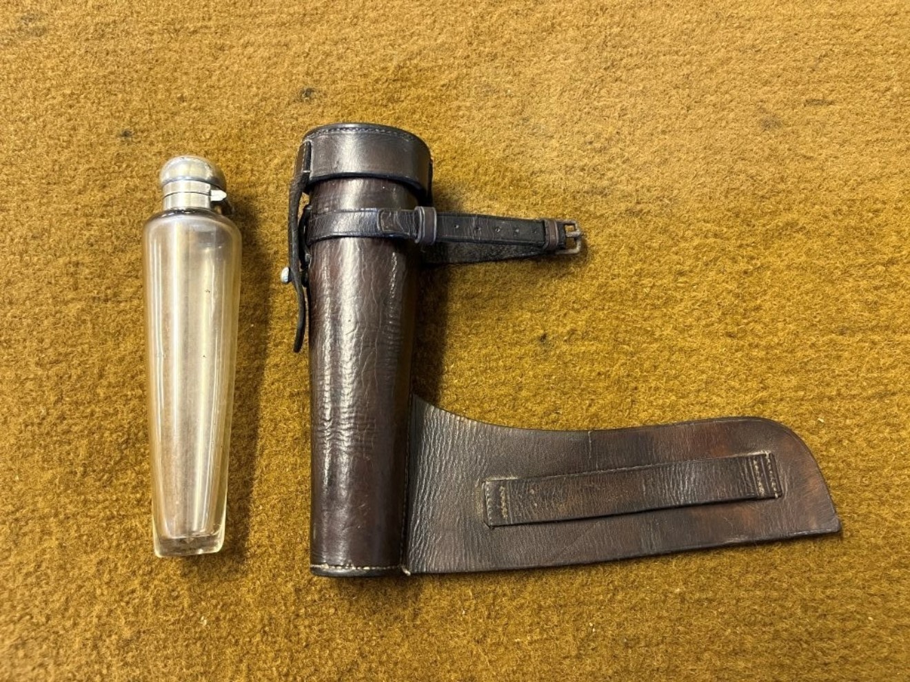 Antique Saddle Spirit Flask with Leather Case and Silver Plated Cap