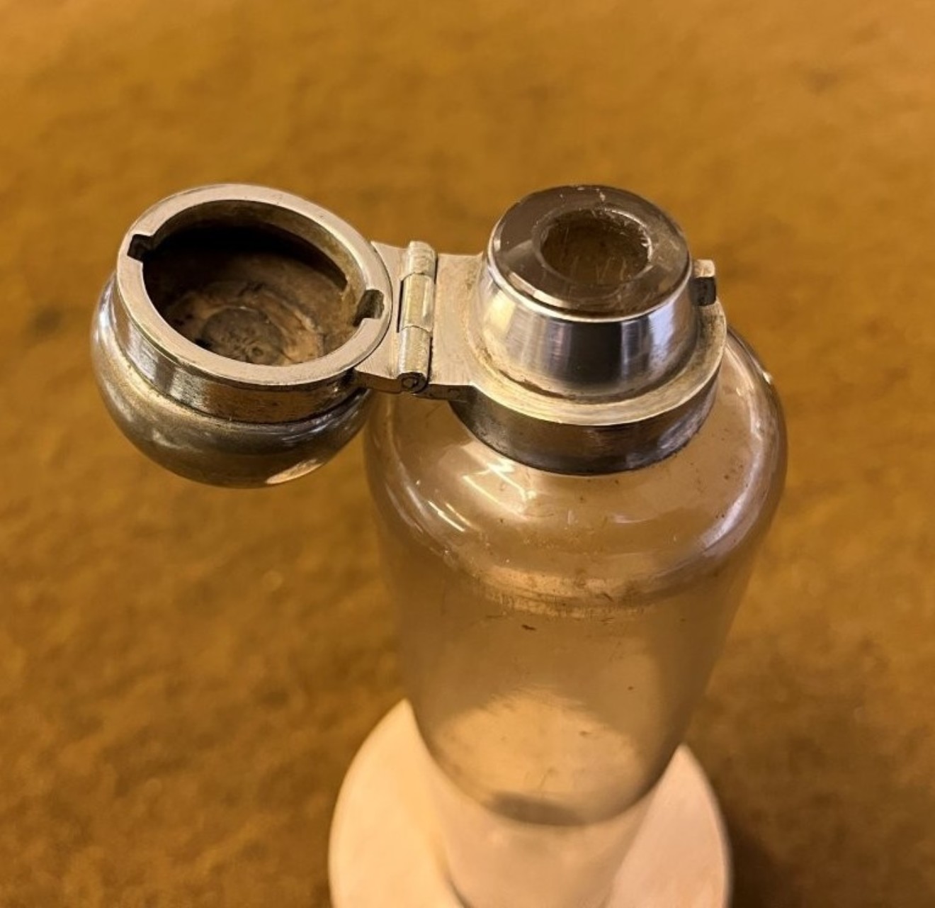 Antique Saddle Spirit Flask with Leather Case and Silver Plated Cap