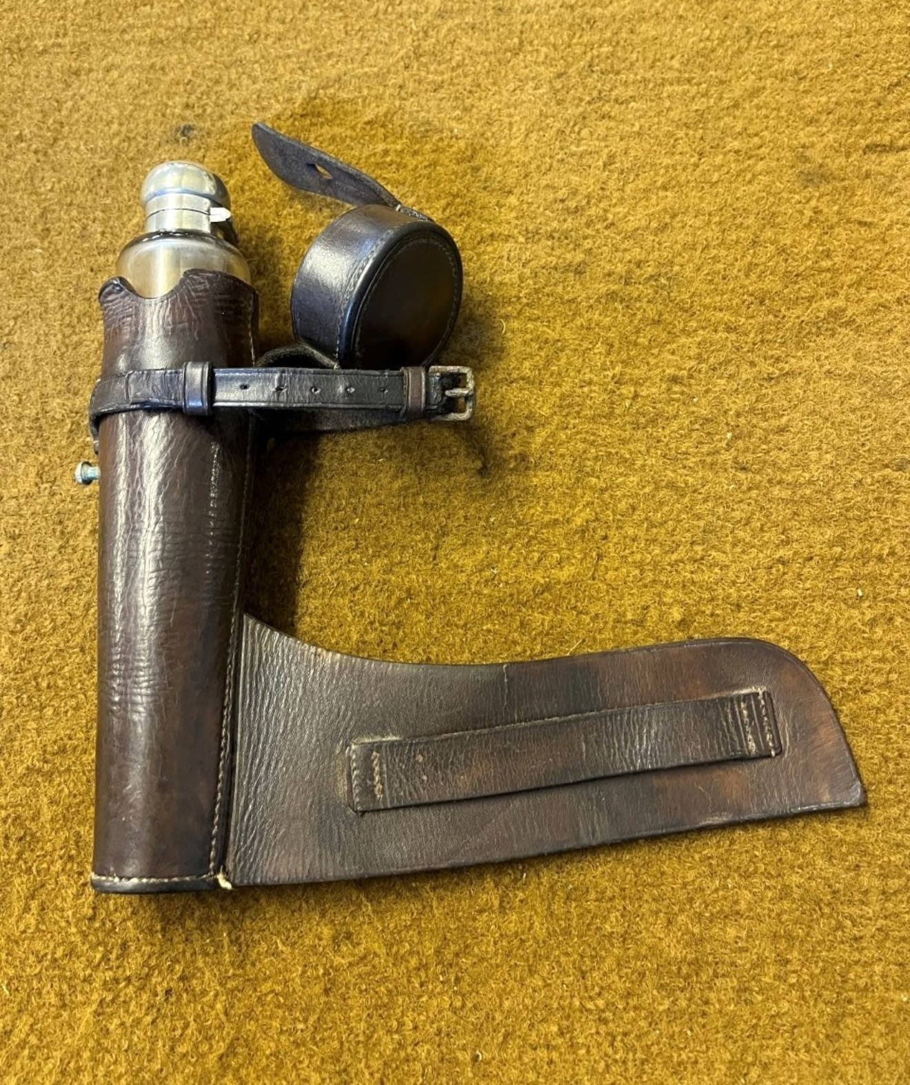 Antique Saddle Spirit Flask with Leather Case and Silver Plated Cap