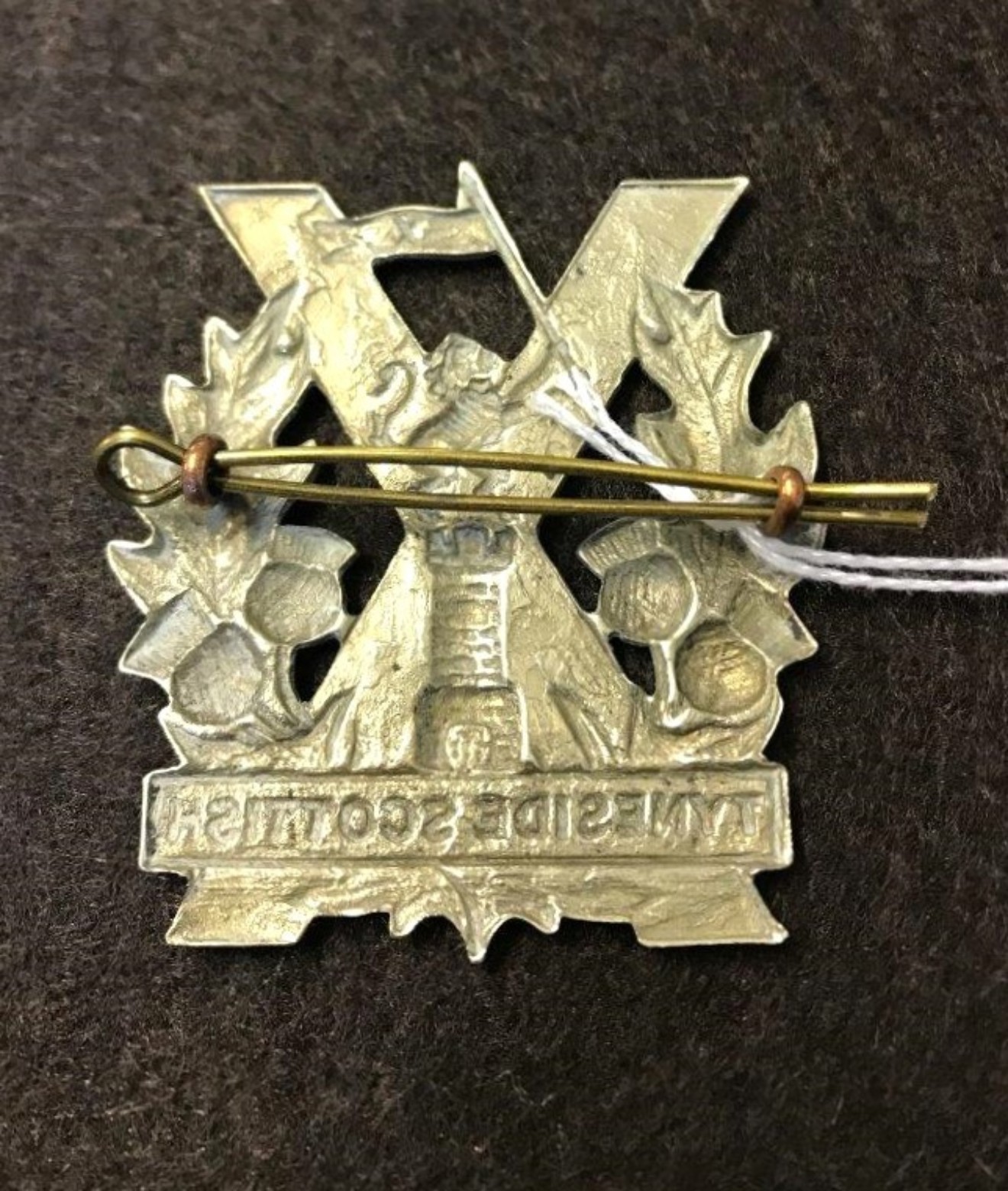 WW1 Tyneside Scottish White Metal Cap Badge