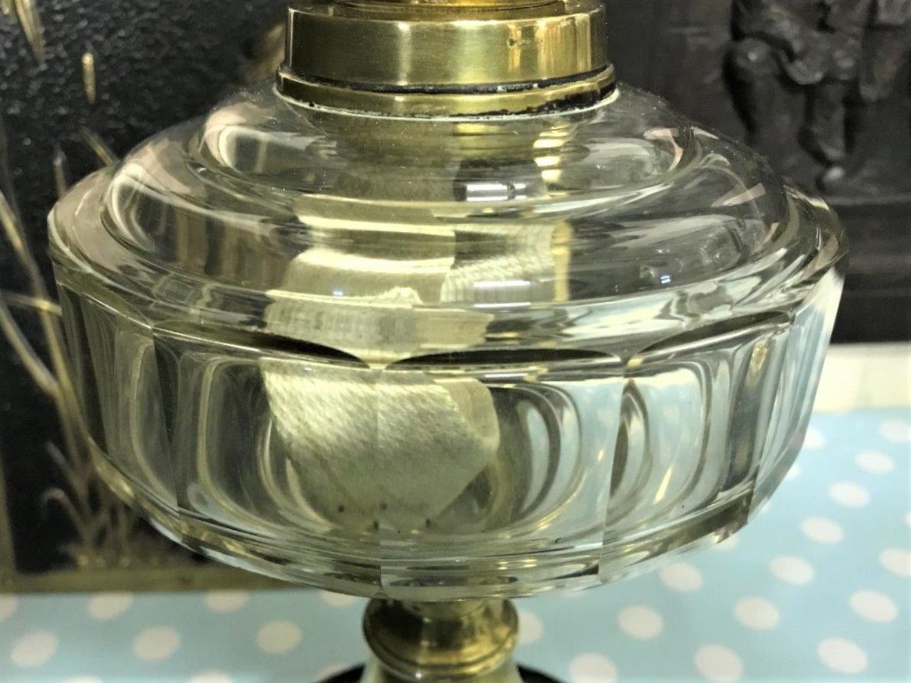 Antique Oil Lamp Faceted Glass Font Brass Repousse Column on a Circular Terracotta Glazed Plinth