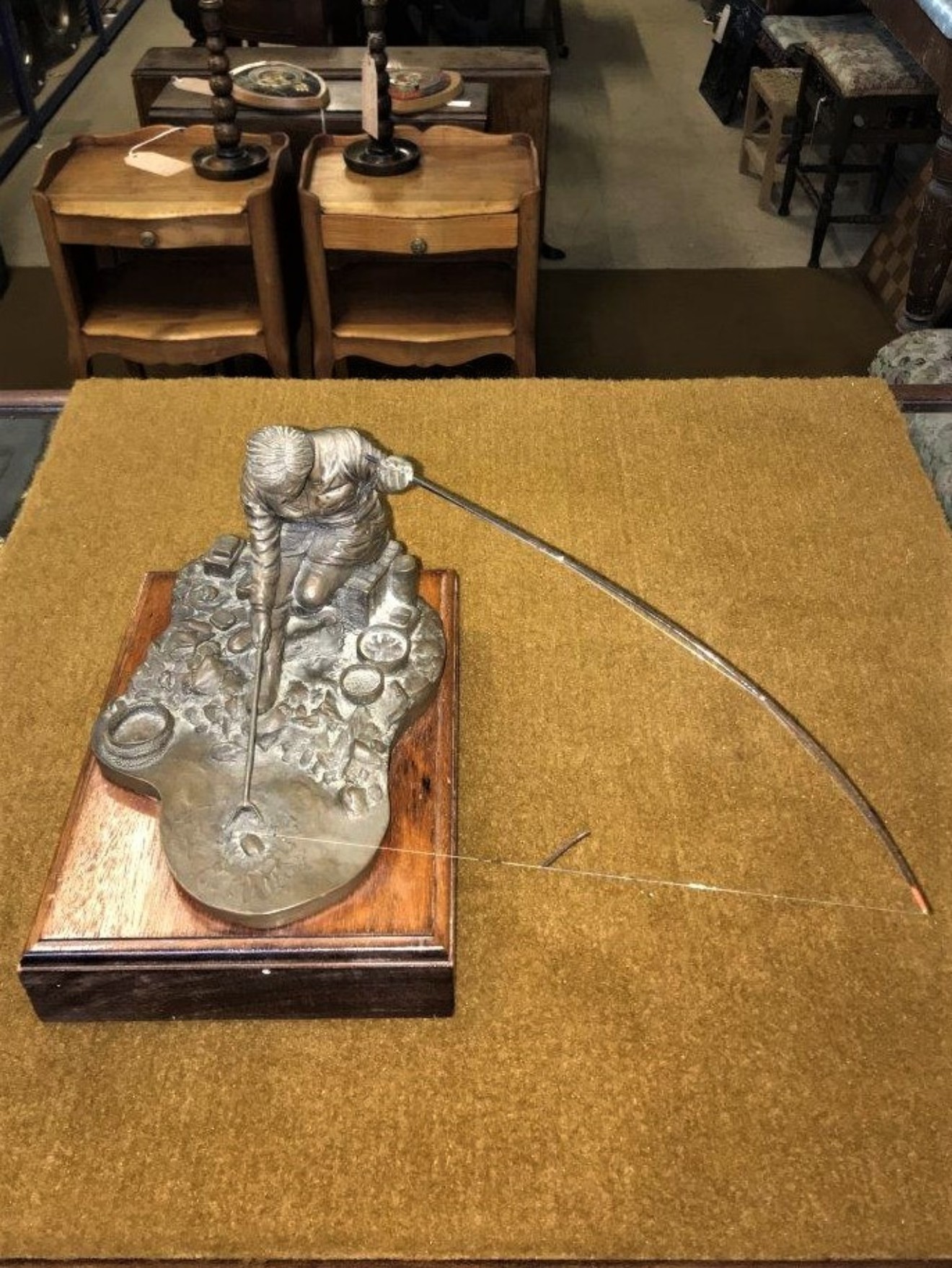 Bronze Effect Resin Sculpture of Fisherman Landing a Fish