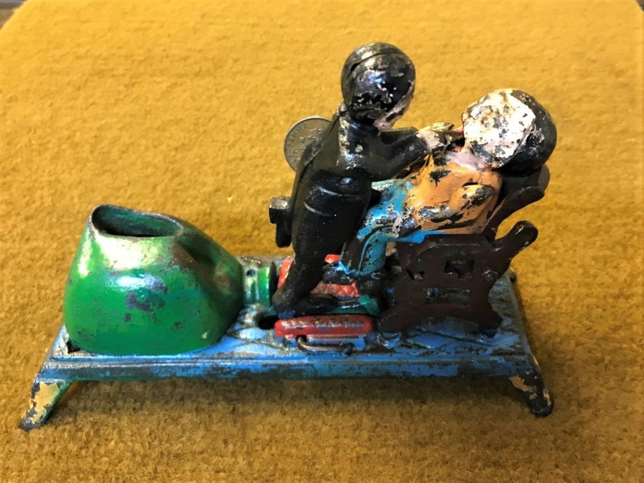 Vintage Cast Iron Penny Bank "Dentist Pulling Tooth"