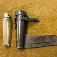 Antique Saddle Spirit Flask with Leather Case and Silver Plated Cap