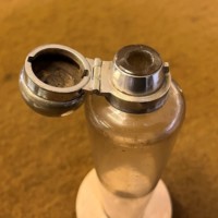 Antique Saddle Spirit Flask with Leather Case and Silver Plated Cap