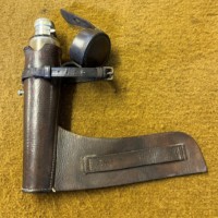Antique Saddle Spirit Flask with Leather Case and Silver Plated Cap