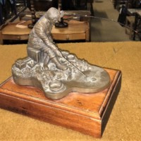Bronze Effect Resin Sculpture of Fisherman Landing a Fish