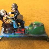 Vintage Cast Iron Penny Bank "Dentist Pulling Tooth"